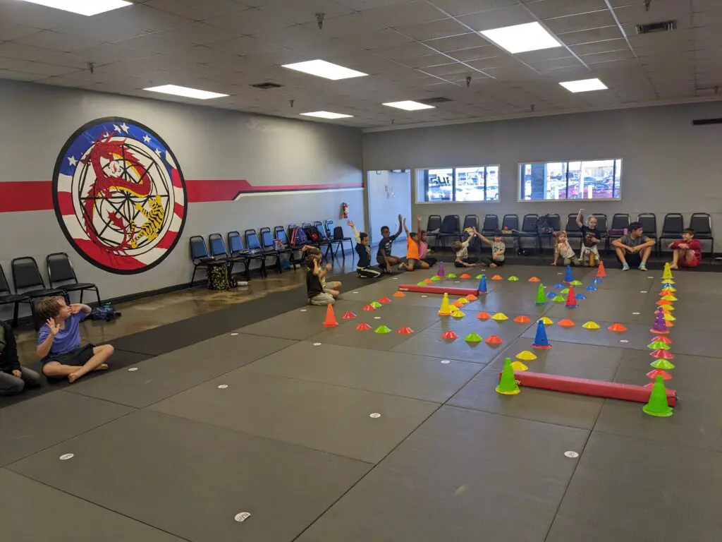 1UP summer campers in a team game